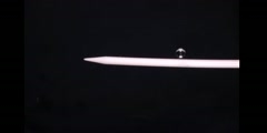 Nasa Video: Water droplets orbiting a needle in space